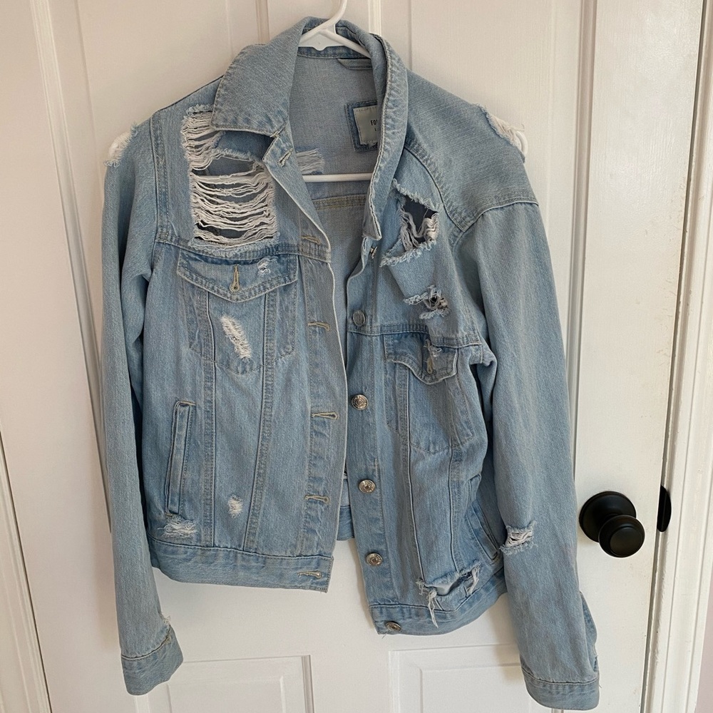 Ripped denim jacket